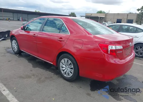 2012 Toyota Camry Le z USA, uszkodzony, nr VIN 4T4BF1FK5CR271303